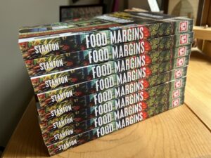 stack of copies of book, "Food Margins"
